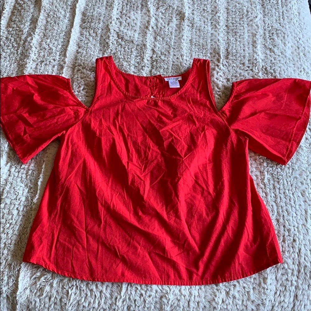 Blouse with cut out back. New